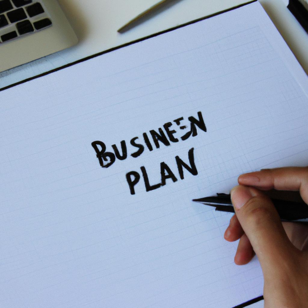 Person writing business plan